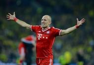 Bayern Munich's midfielder Arjen Robben celebrates at the final whistle at Wembley Stadium in London on May 25, 2013